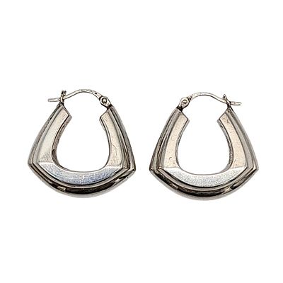 Signed Fine Silver Hollow Form Sculptural Hoop Earrings. Signed 999 hallmark. 7.4g