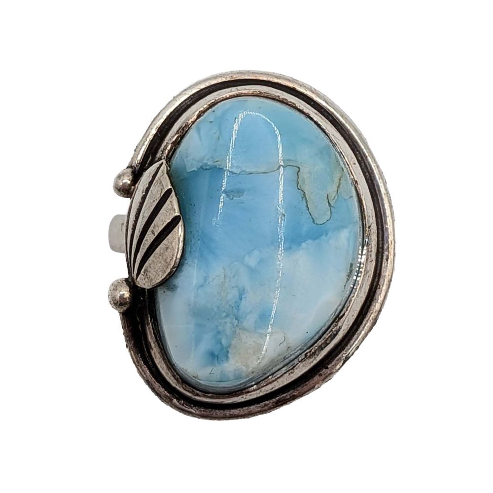 Lot 154: Sterling Silver Larimar Wire Framed Leaf Detail Ring