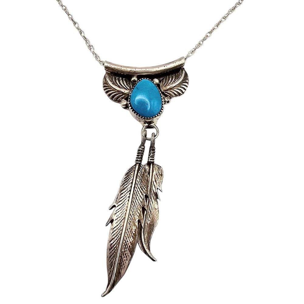 Lot 160: Running Bear Turquoise Sterling Silver Feather Necklace