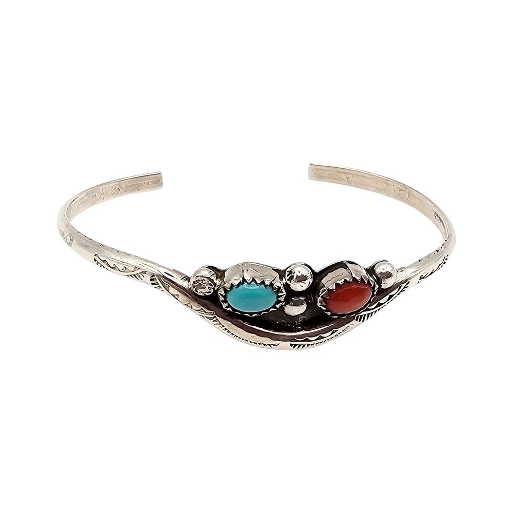 Lot 187: Navajo Coral Turquoise Sterling Silver Child’s Bracelet