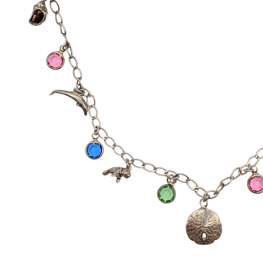 Lot 435: Sterling Silver Beach Crystal Charm Necklace