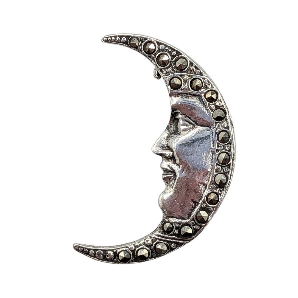 Lot 475: Sterling Silver Mother of Pearl Marcasite Man in the Moon Brooch