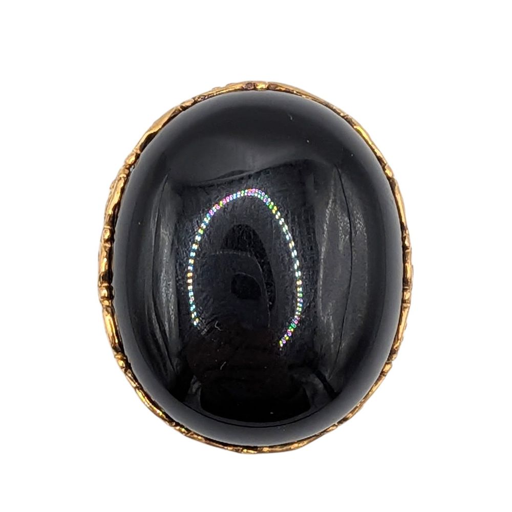 Lot 558: Signed Gold Over Metal Black Rhinestone Oval Filigree Ring