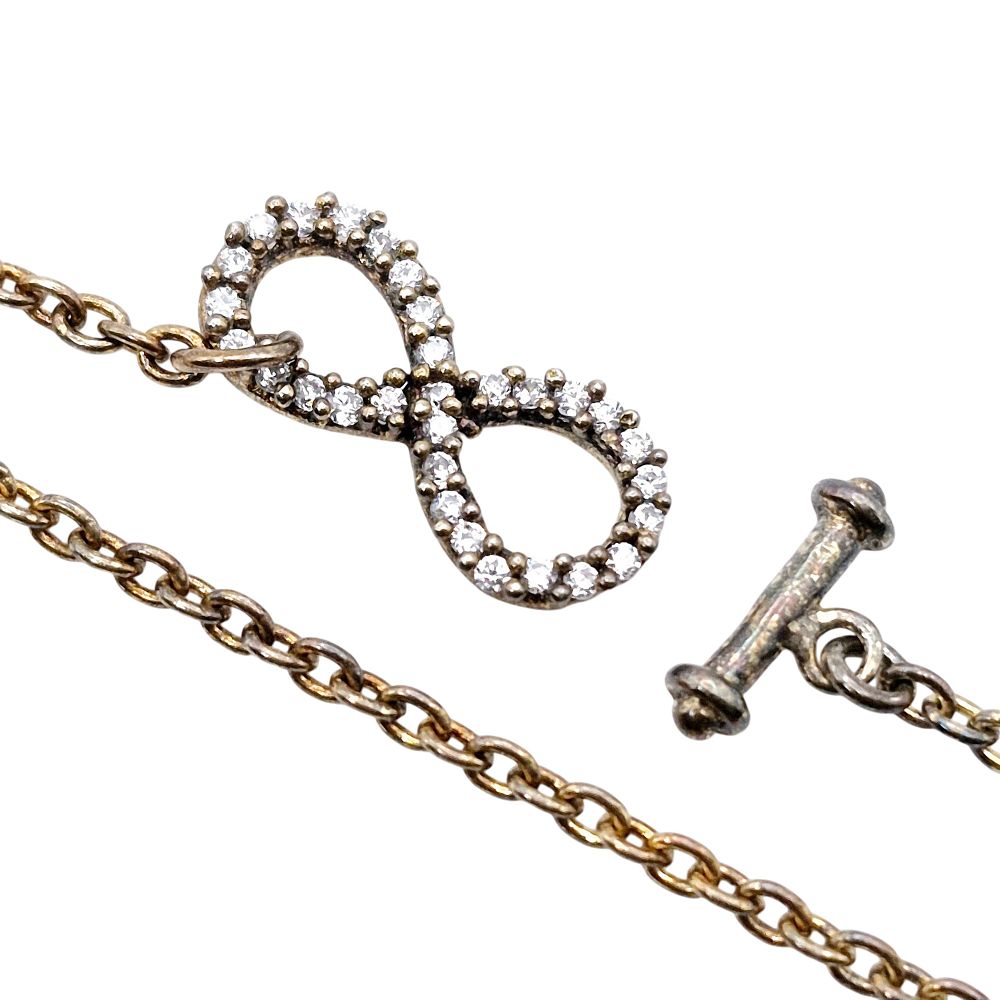 Lot 394: Sterling Rhinestone Infinity Symbol Cable Chain Bracelet