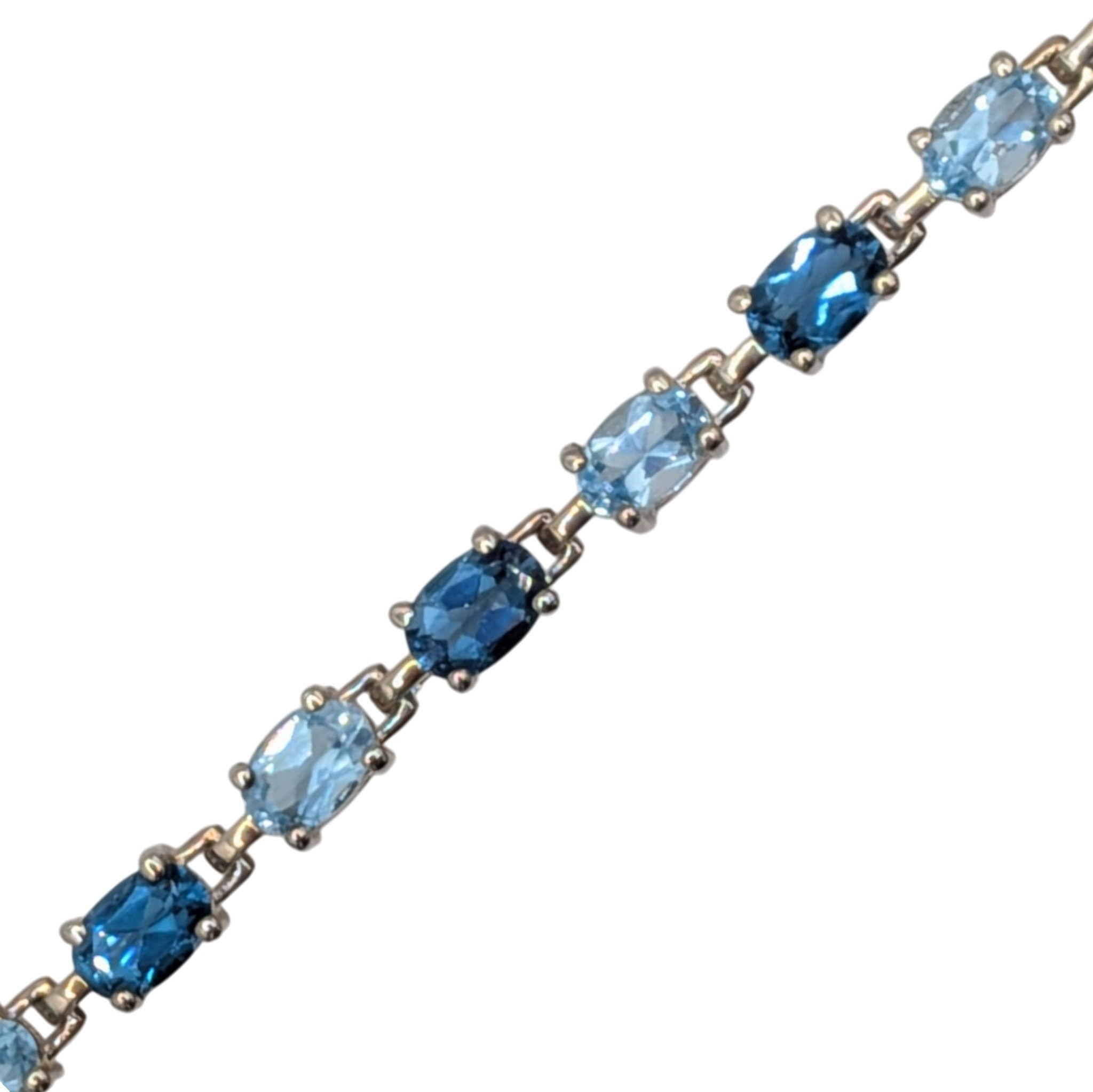 Signed Sterling Silver Blue Topaz Two Tone Oval Cut Tennis Bracelet