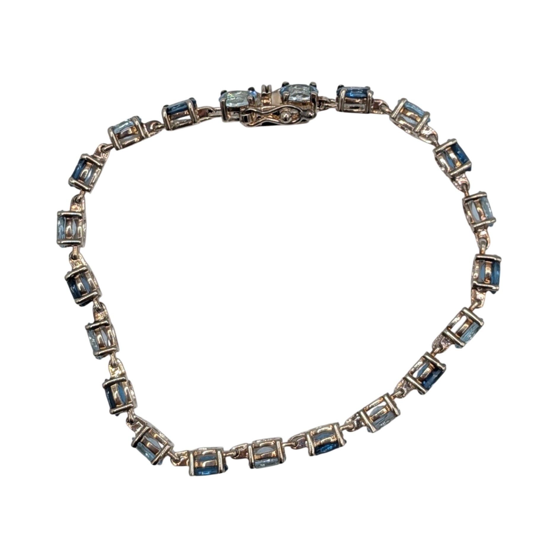 Signed Sterling Silver Blue Topaz Two Tone Oval Cut Tennis Bracelet