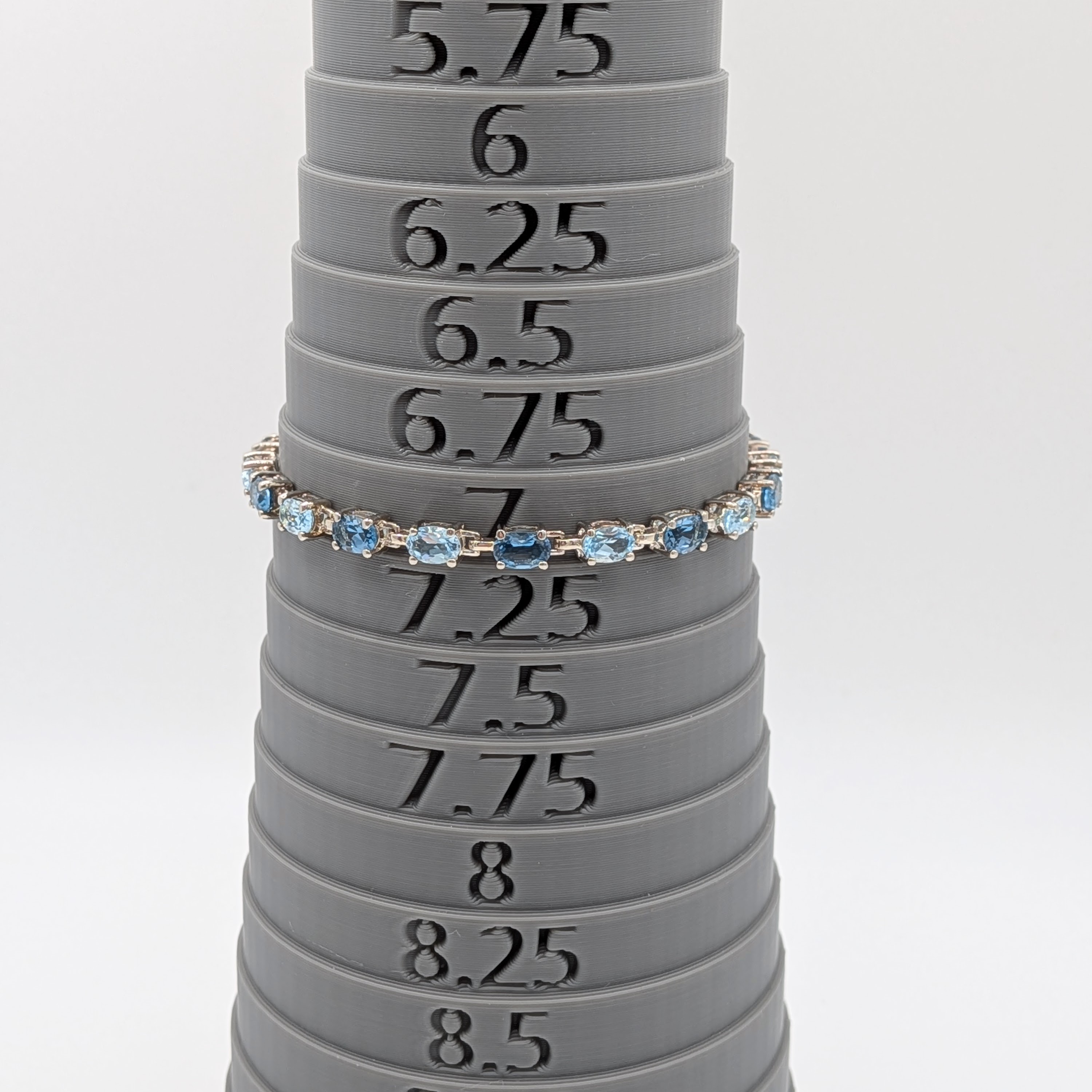 Signed Sterling Silver Blue Topaz Two Tone Oval Cut Tennis Bracelet