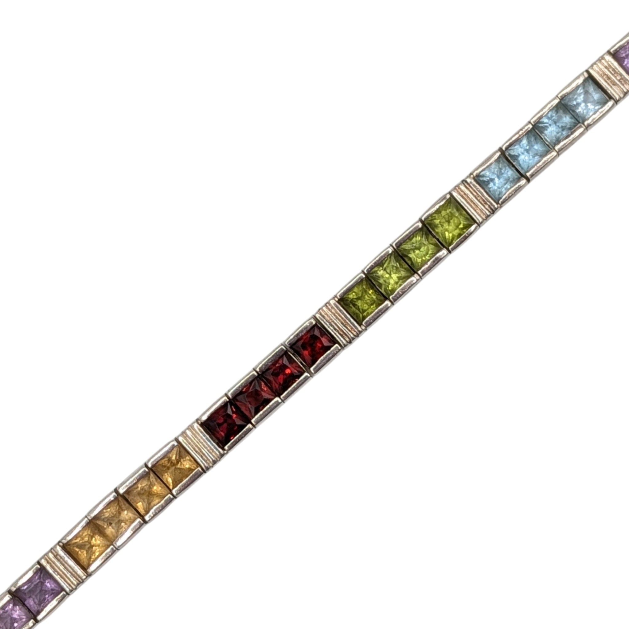 Signed Sterling Silver Multi-Stone Articulated Tennis Bracelet