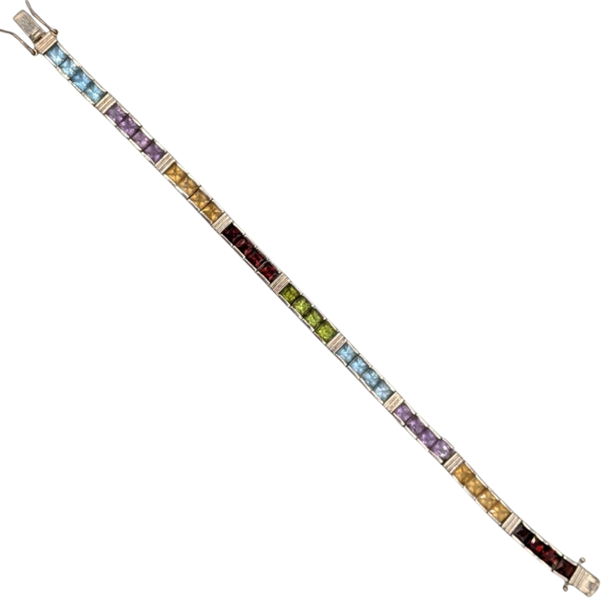 Signed Sterling Silver Multi-Stone Articulated Tennis Bracelet