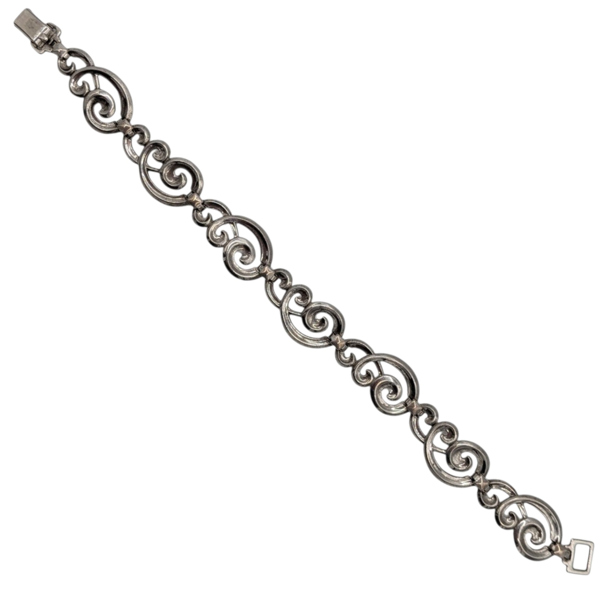 Signed Sterling Silver Scrolling Sectional Bracelet