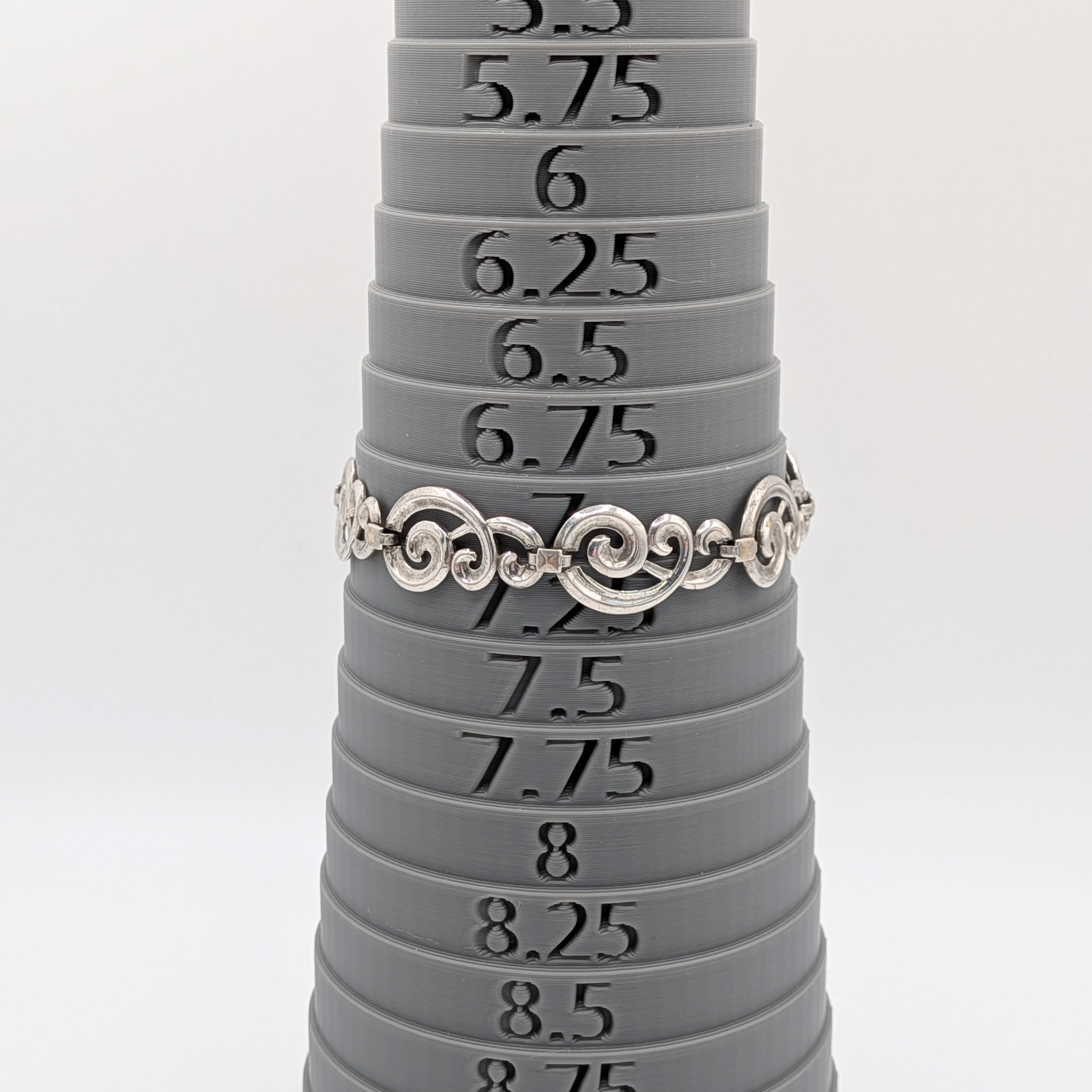 Signed Sterling Silver Scrolling Sectional Bracelet