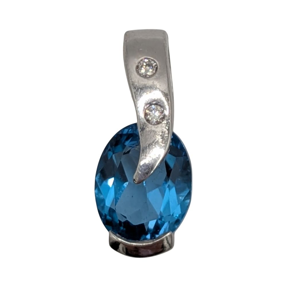 Lot 479: Signed Sterling Silver Diamond Blue Topaz Oval Swoop Pendant