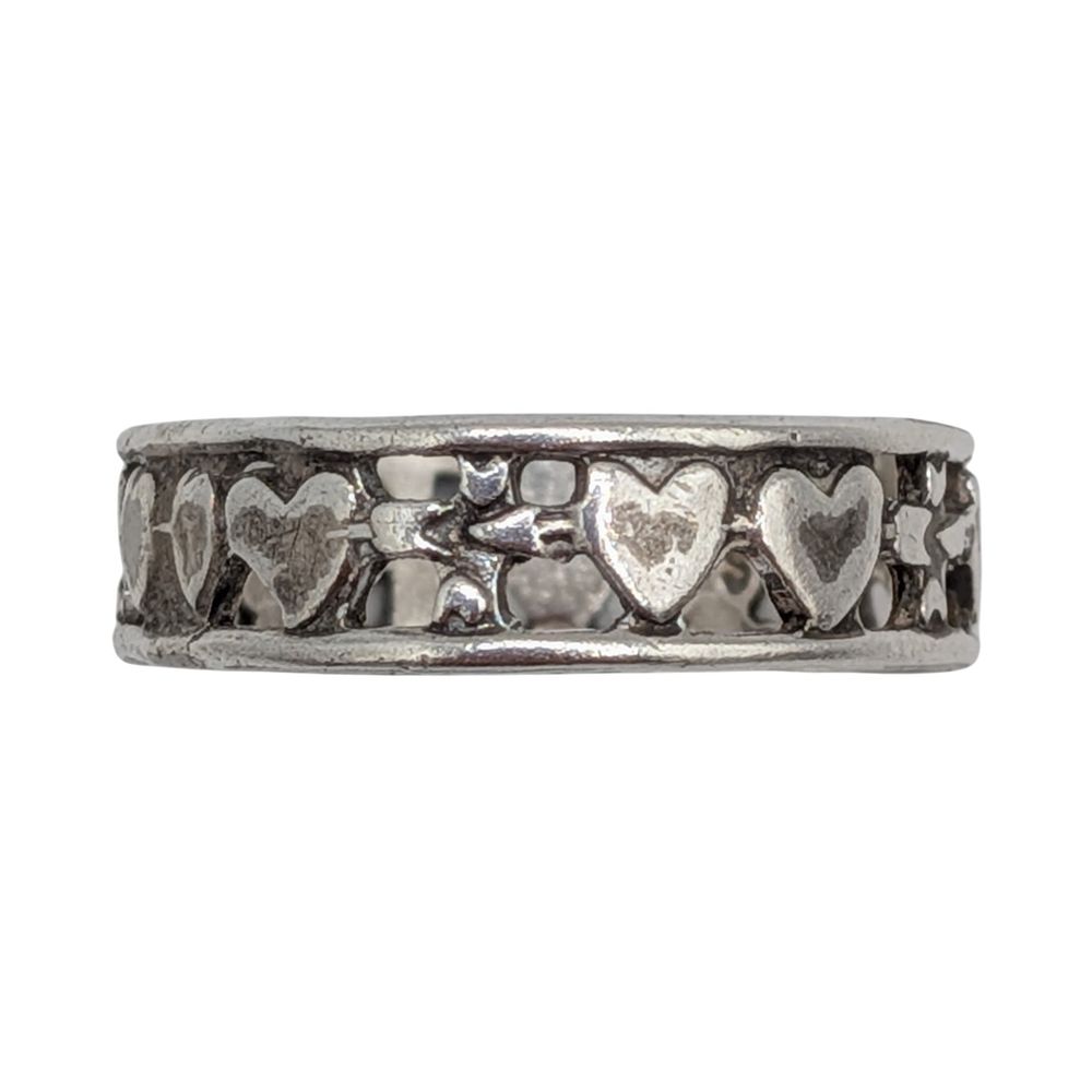 Lot 577: Sterling Silver Arrow Through Hearts Band Ring Size 6.75