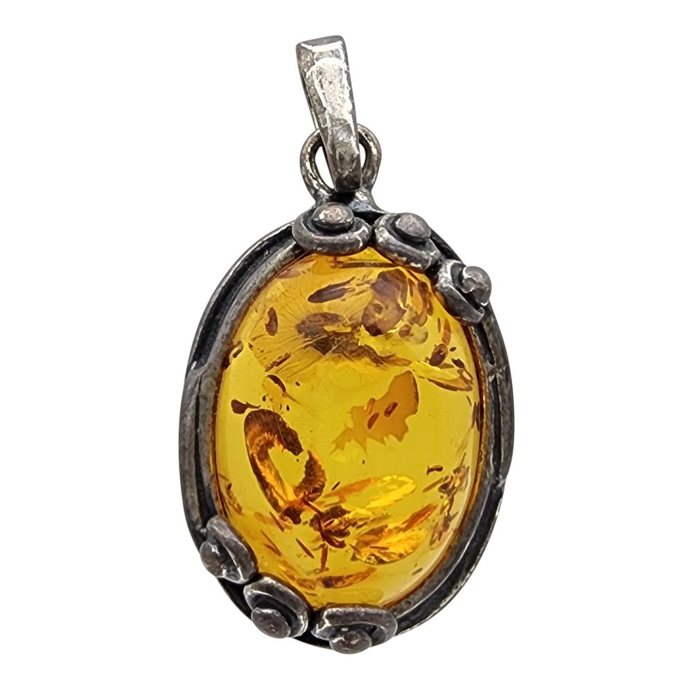 Lot 213: Vintage Sterling Amber Pendant