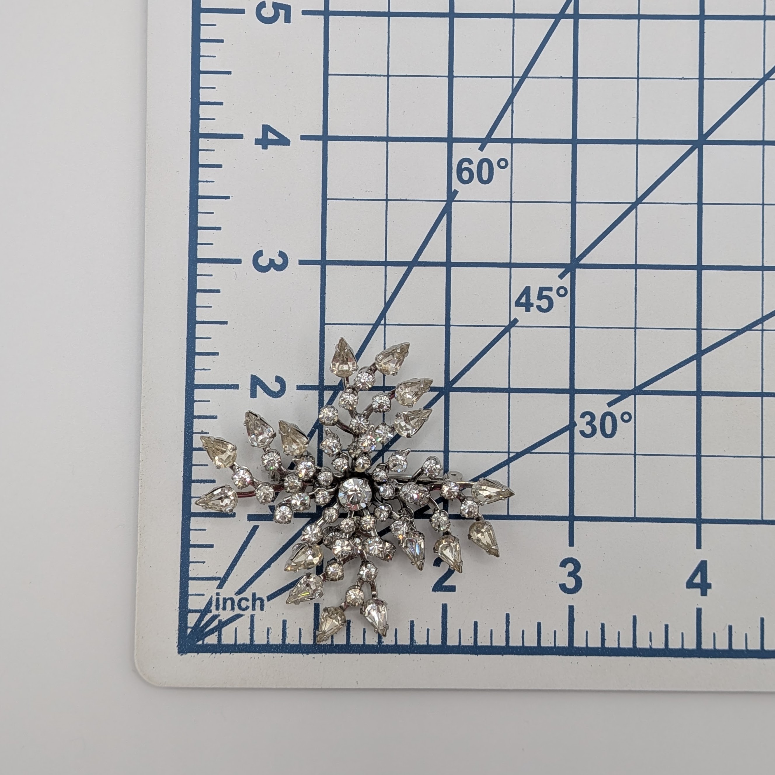 Kramer Silver Tone Rhinestone Starburst Brooch