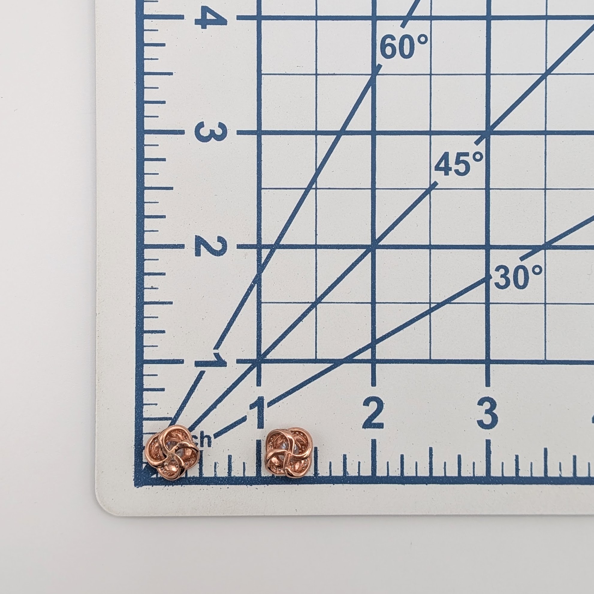 Signed Rose Gold Over Sterling Silver Rhinestone Twisted Halo Stud Earrings