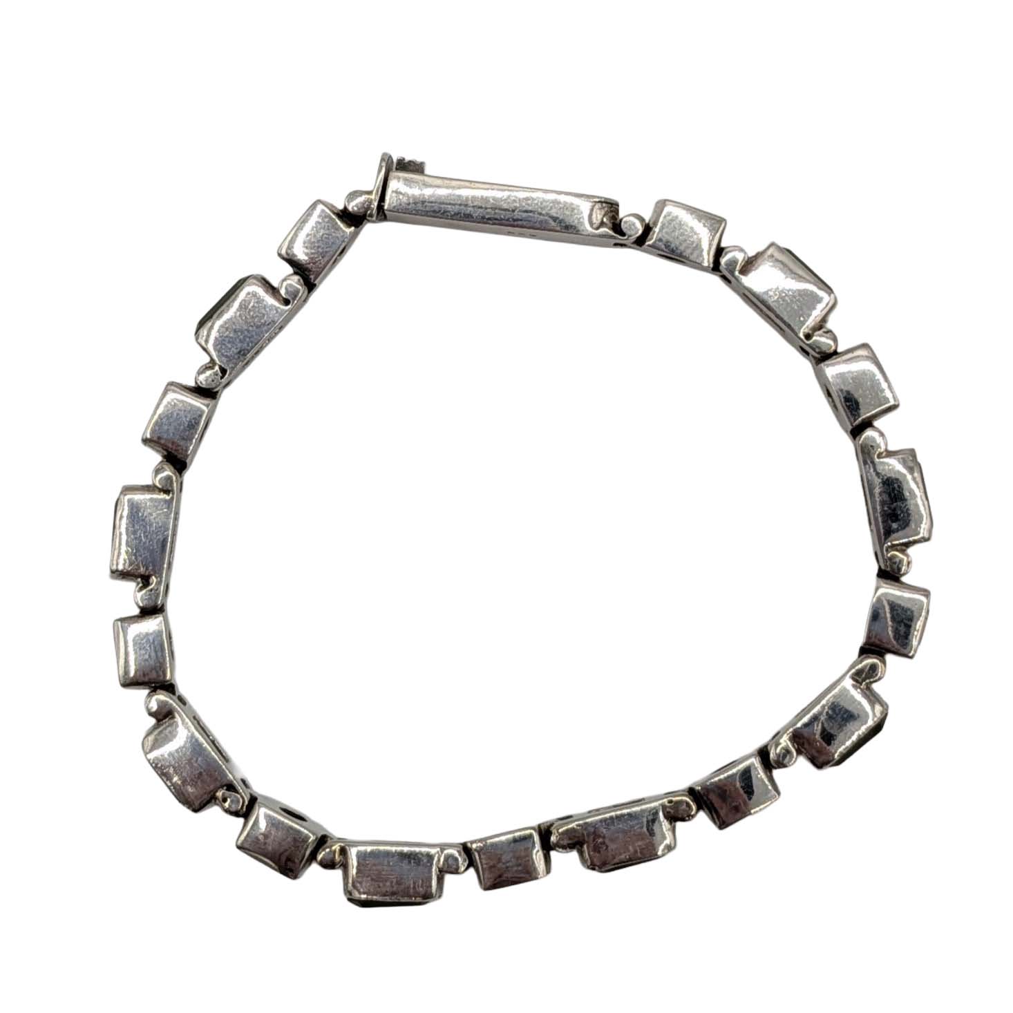 Sterling Silver Green Rhinestone Spiral Link Tennis Bracelet