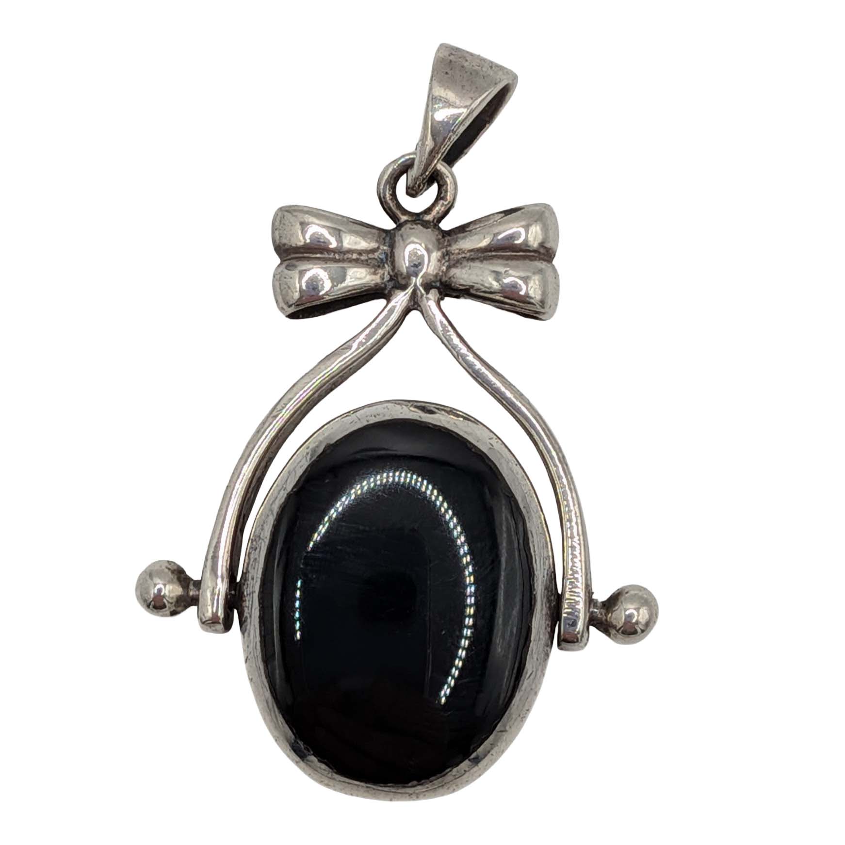 Sterling Silver Onyx Mother Of Pearl Bow Flip Pendant