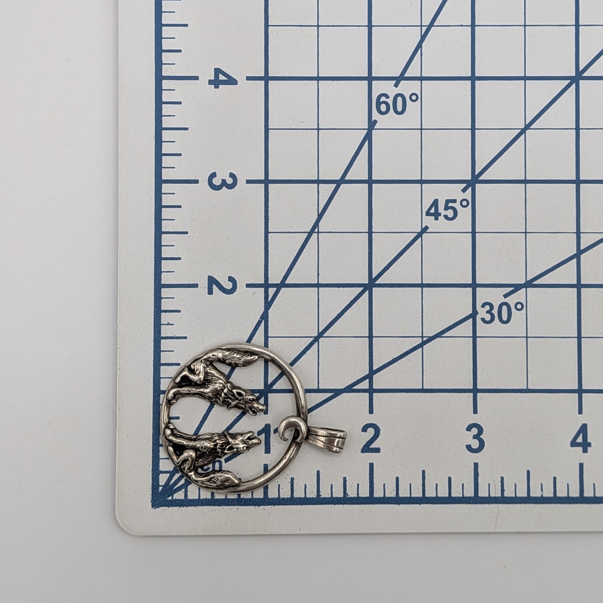 Signed Sterling Silver Howling Wolves Pendant