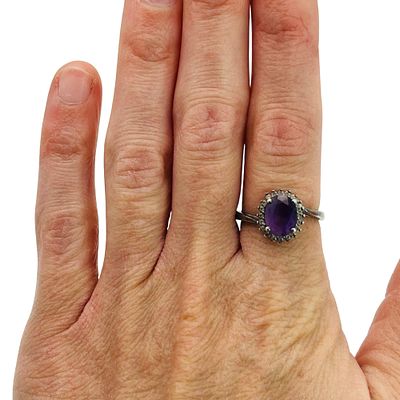 Signed Sterling Amethyst Halo Detail Ring Size 7. Signed RUF Sterling amethyst halo detail ring 
