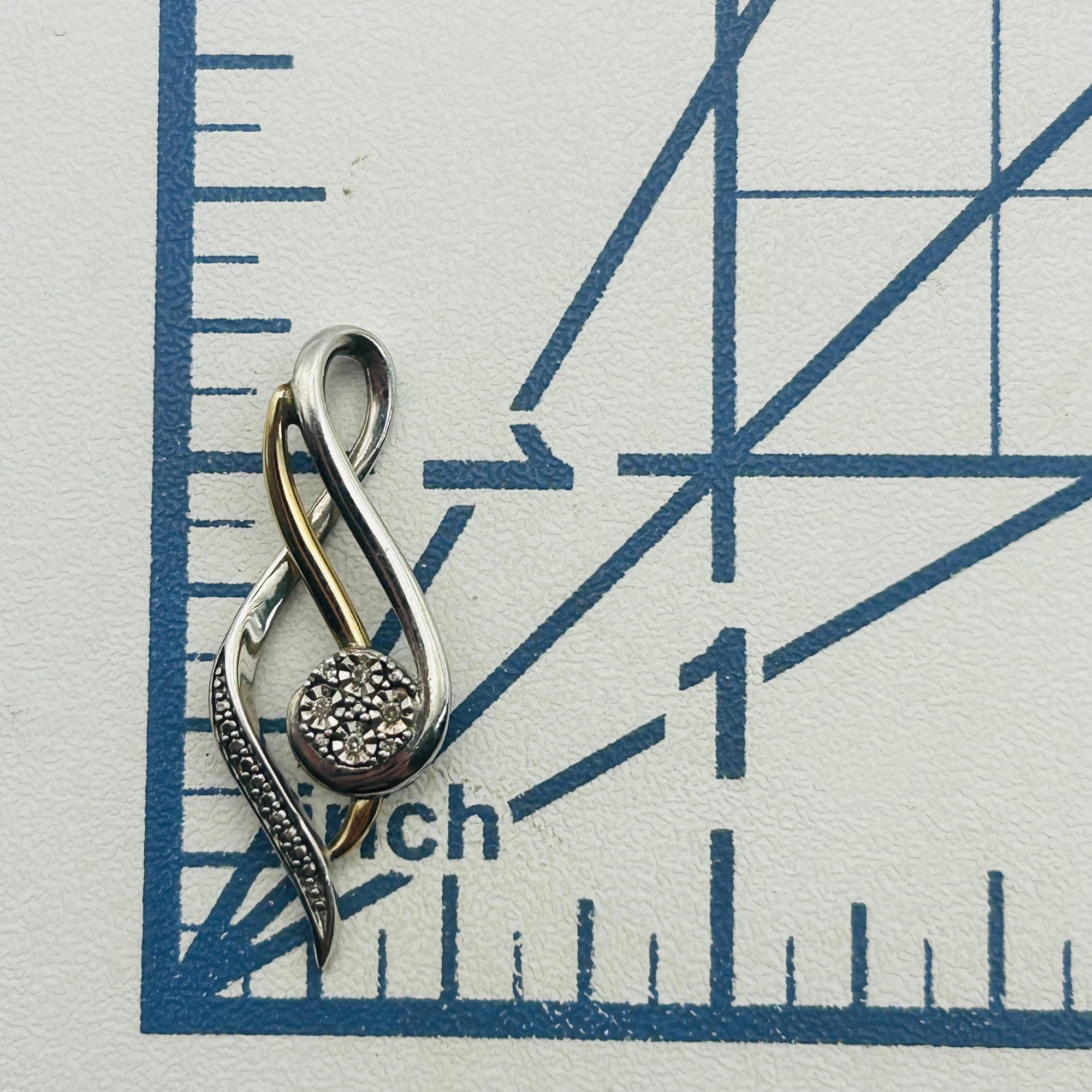 Sterling 10k Diamond Music Note Pendant