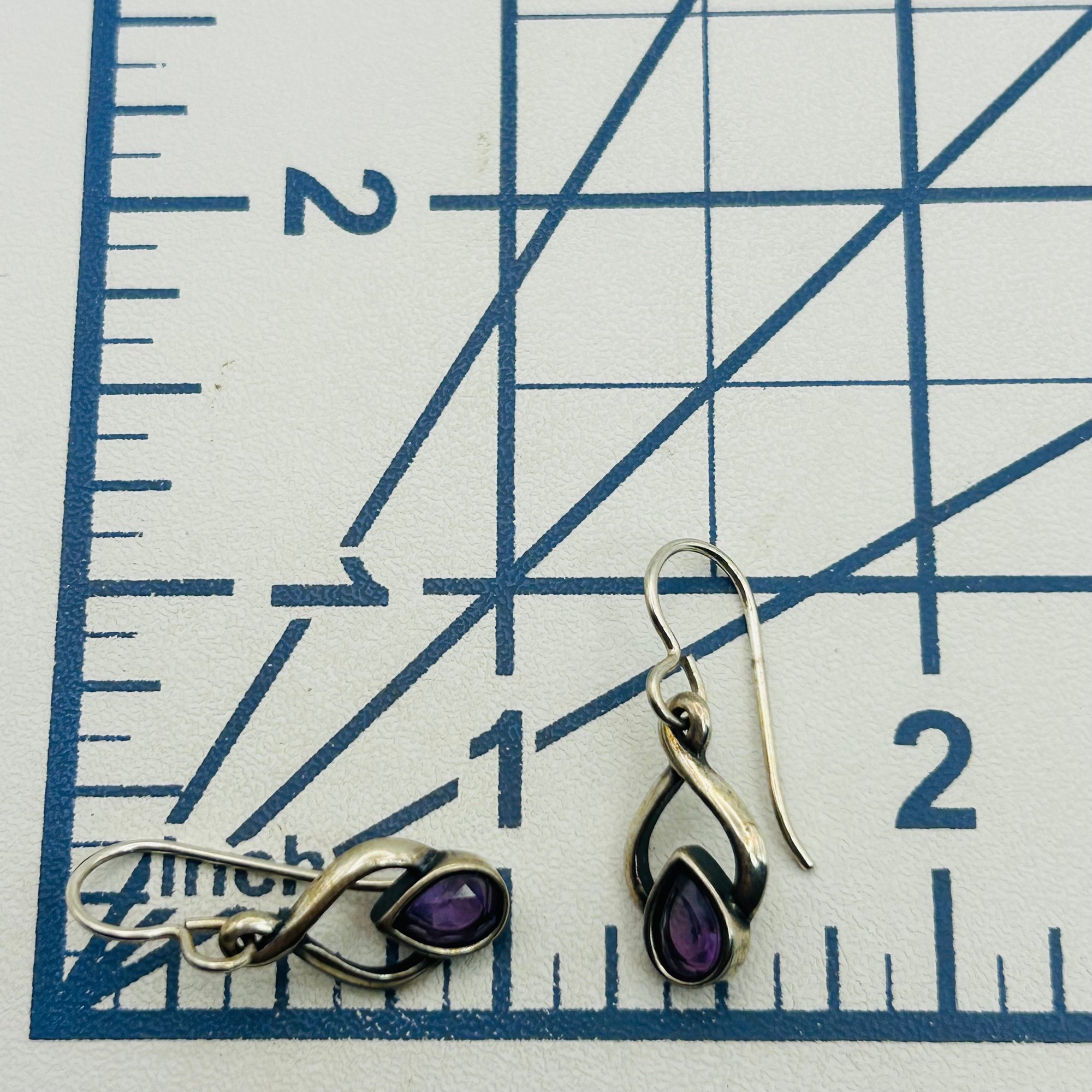 Signed Sterling Amethyst Infinity Earrings