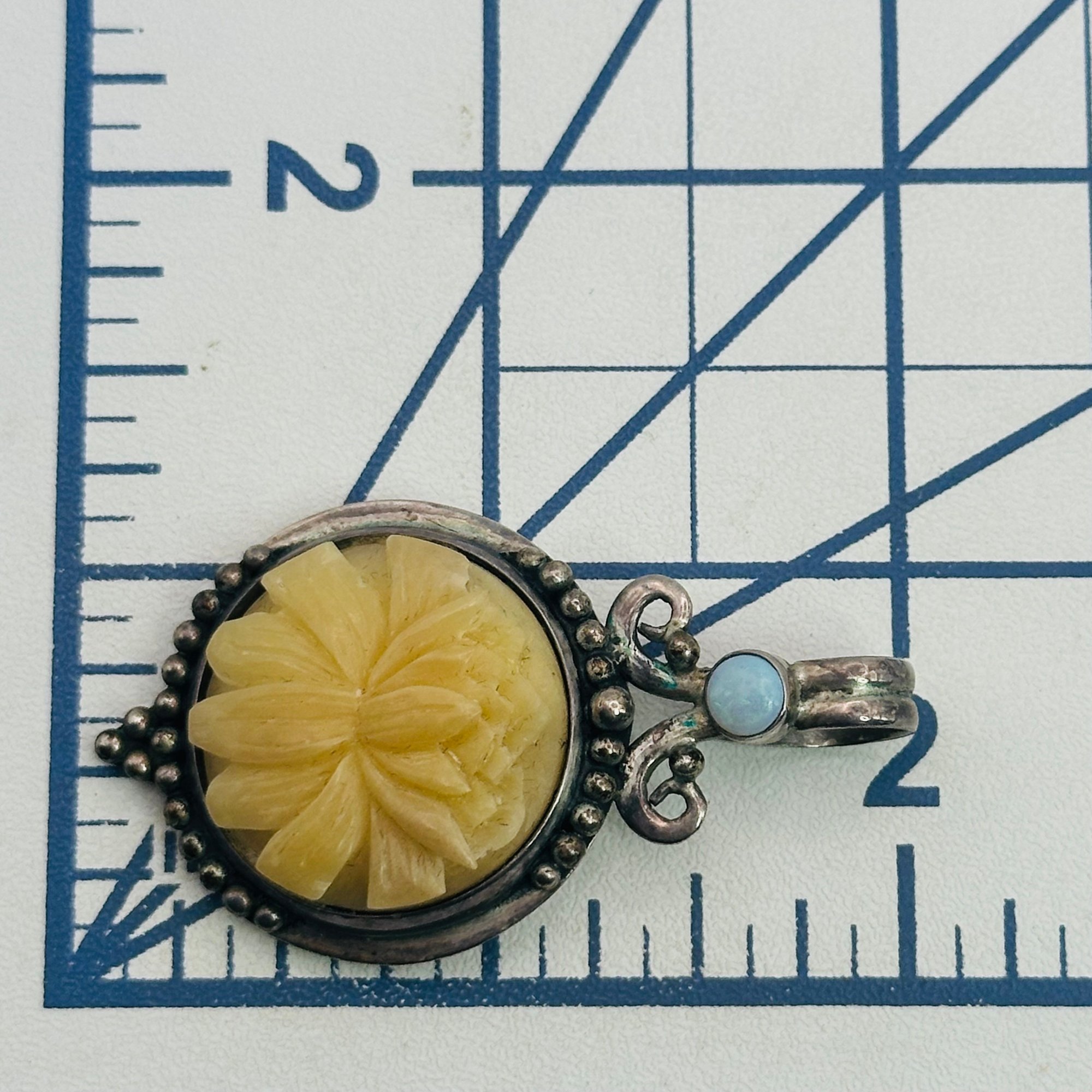 Sterling Carved Flower Pendant