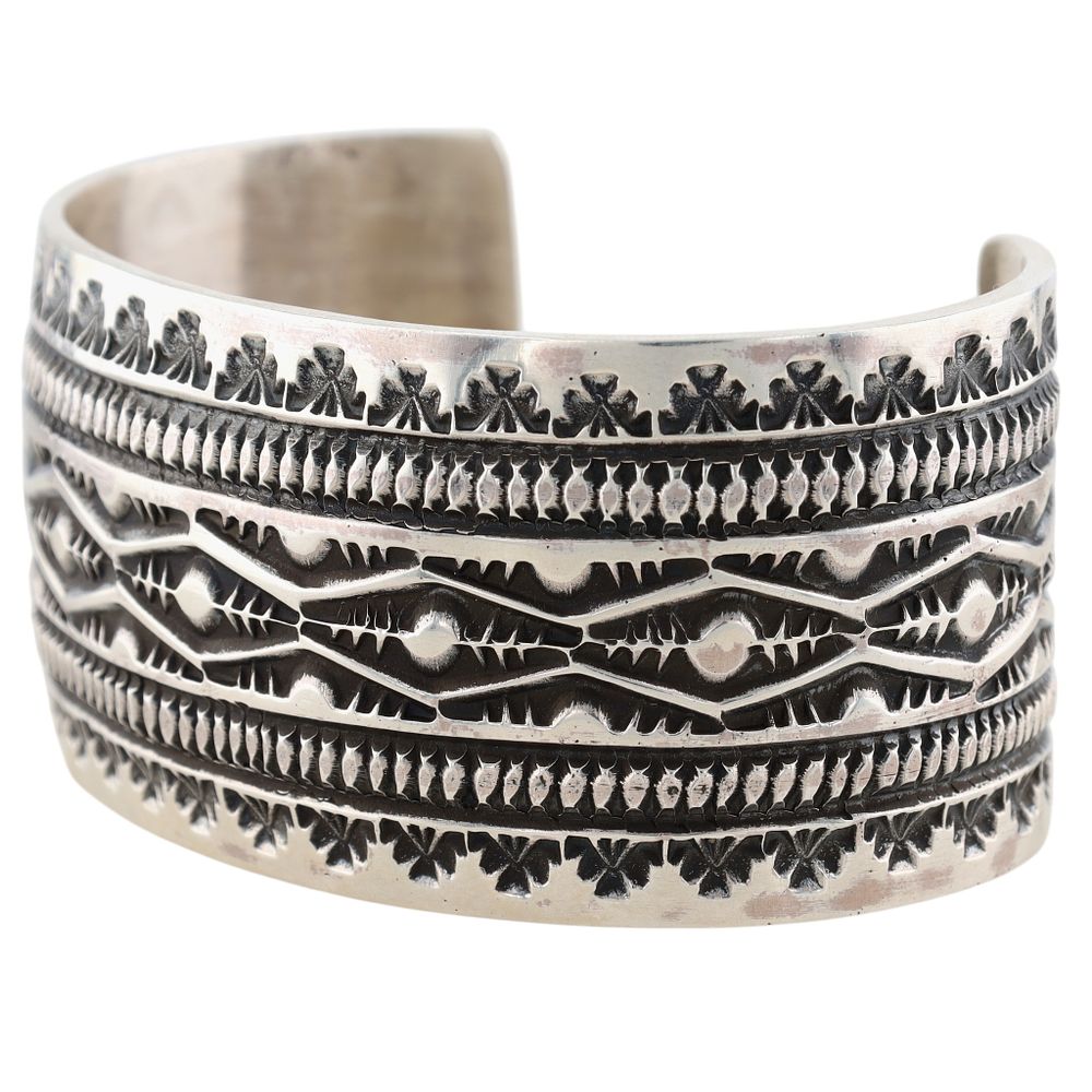 Lot 129: Richardson's Trading Post: Leonard Maloney Navajo Sterling Stamped Cuff Bracelet