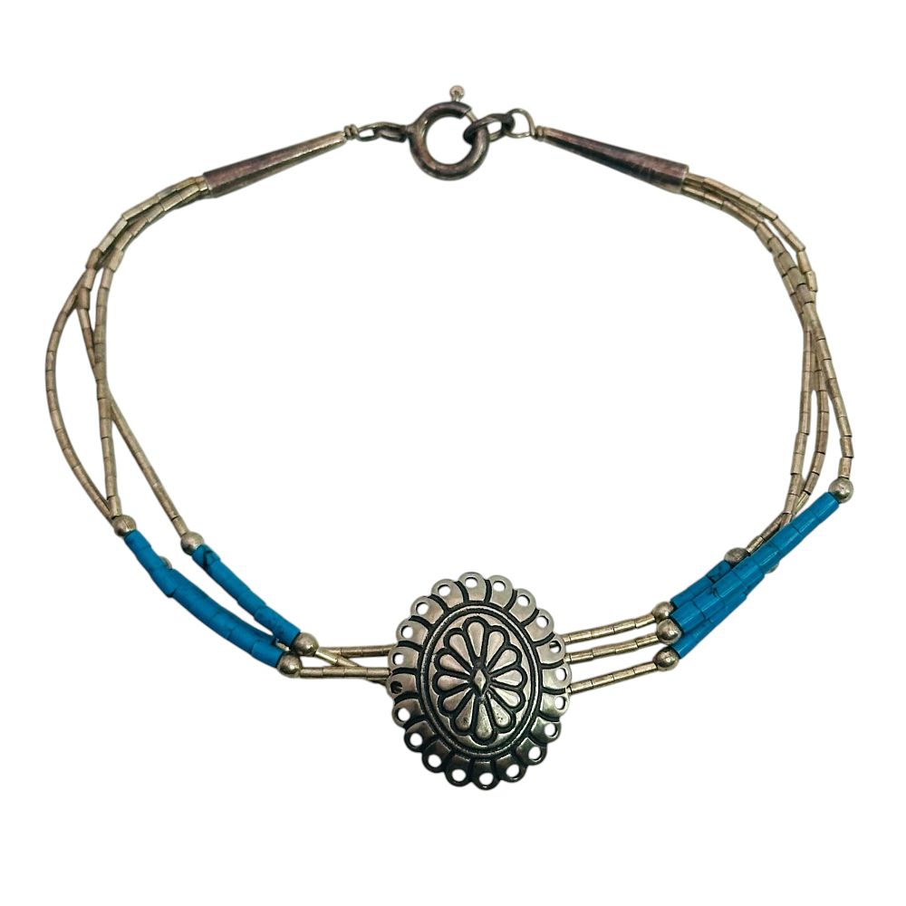 Lot 86: Southwest Sterling Turquoise Liquid Silver Bracelet