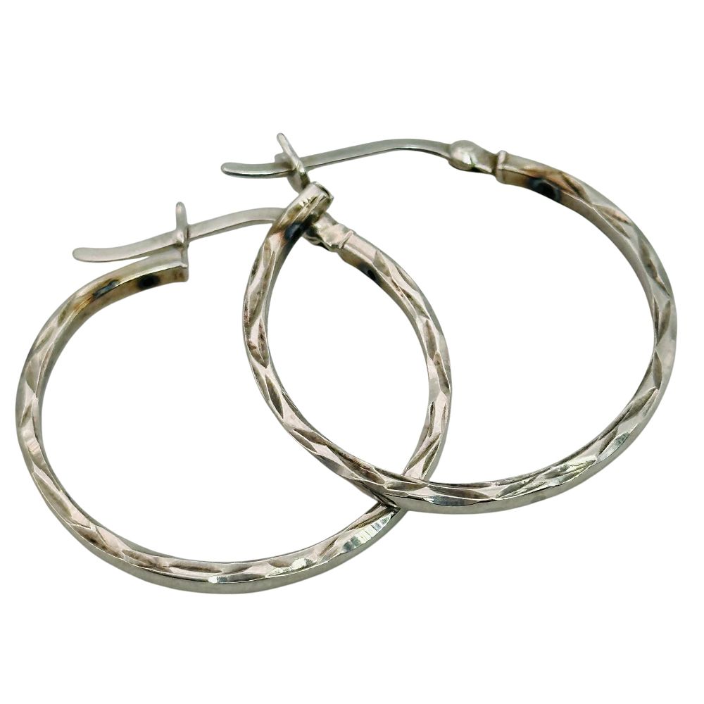Lot 239: Signed Sterling Hoop Earrings