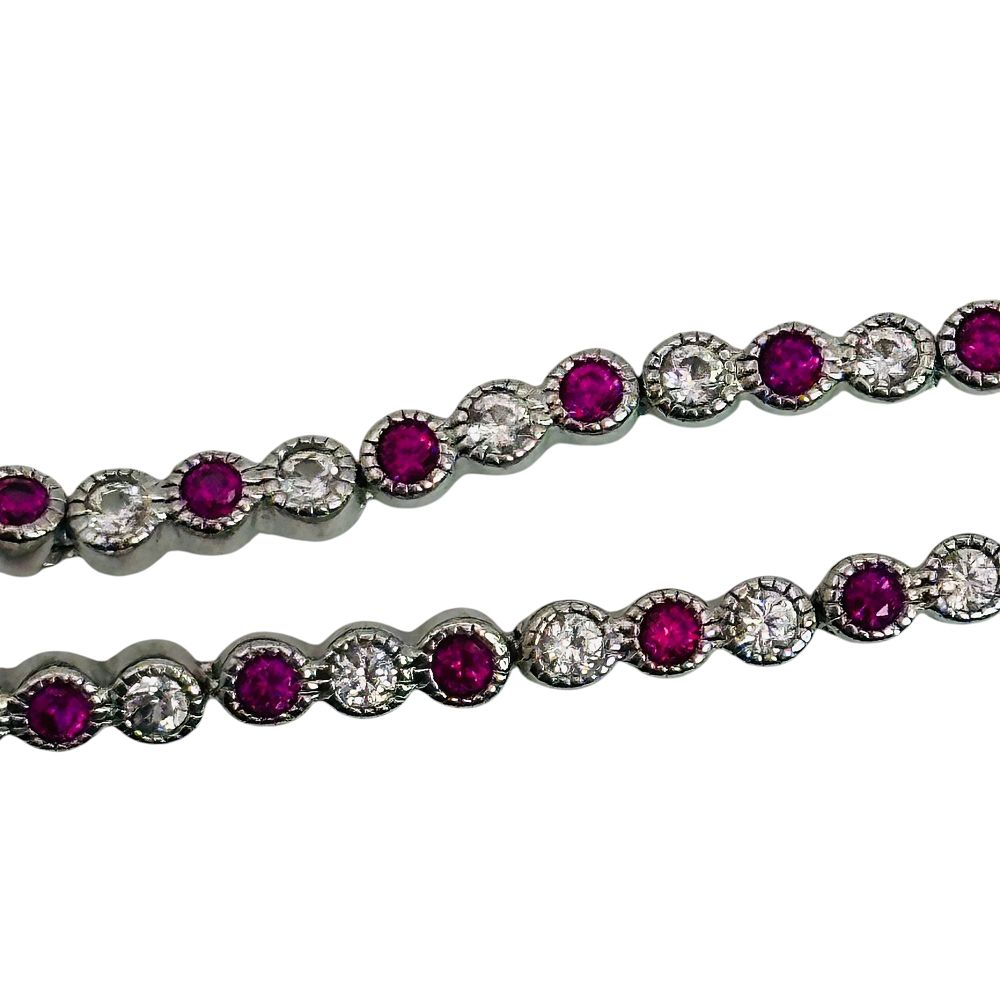 Lot 305: Signed Sterling Pink Sapphire Bracelet