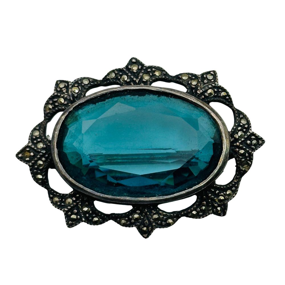 Lot 320: Vintage Sterling Marcasite Blue Stone Brooch