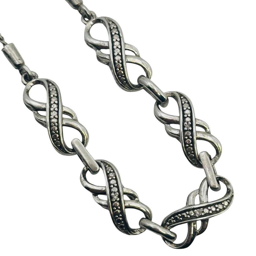 Lot 402: Sterling Diamond Accent Infinity Bracelet