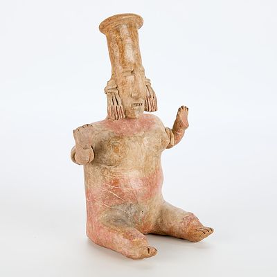 Jalisco Pre-Columbian Seated Female Figure. Jalisco pre-Columbian pottery in the form of a