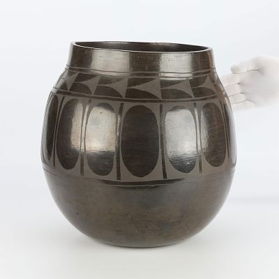 Large Pueblo Blackware Olla Jar. Large Pueblo black-on-black ceramic olla pot, possibly Santo