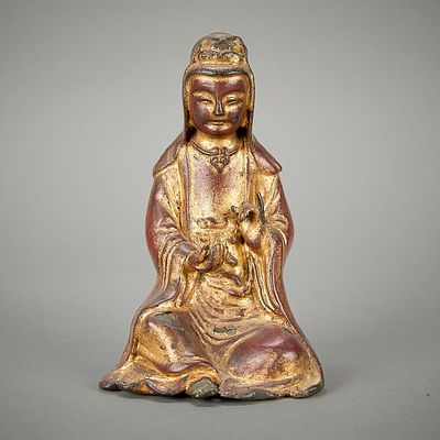Chinese Late Ming Gilt Lacquered Guanyin Bronze. Chinese gilt lacquered bronze depicting a 
