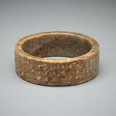 Chinese Carved Mottled Jade Cuff Bracelet. Chinese carved jade bracelet or cuff. The mottled 