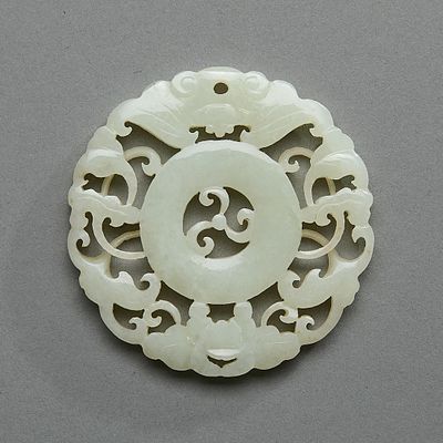 Chinese Qing Carved White Jade Roundel Plaque. Chinese carved and pierced white jade roundel or 