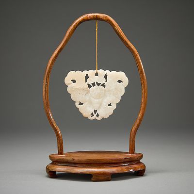 Chinese Carved White Jade Butterfly Plaque. Chinese carved mottled white jade plaque depicting a 