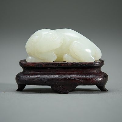 Chinese Late Qing Carved Jade Cat. Chinese carved jade figure depicting a cat or feline form in 