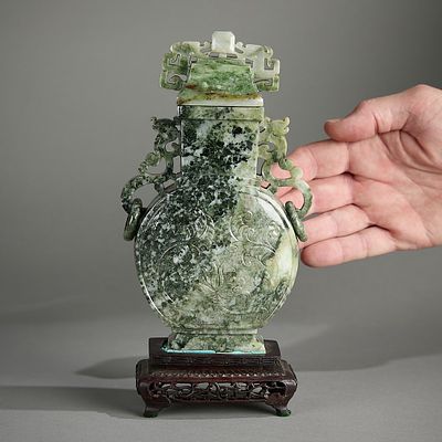 Chinese Carved Mottled Jade Urn Vase. Chinese carved jade or jadeite lidded urn vase. Of a 