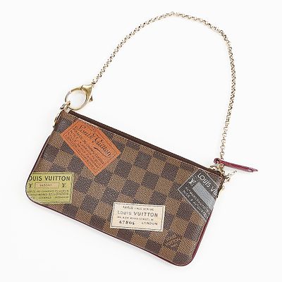 Louis Vuitton Trunks Labels Pochette Mila MM. Louis Vuitton pochette in Damier ebene trunks 