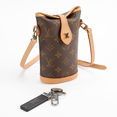 Louis Vuitton Fold Me Pouch & Keychain. Louis Vuitton bag and key chain, including:Louis Vuitton 