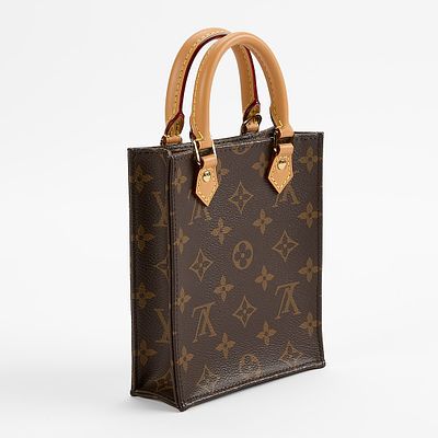 Louis Vuitton Petit Sac Plat, circa 2020 new in box. In brown monogram with leather trim. Two 