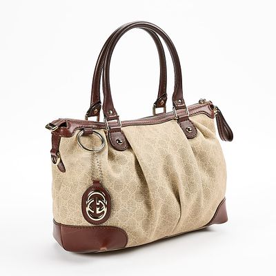 Gucci Sukey Monogram Tote. Gucci Sukey tote in beige monogram canvas with brown leather trim and 