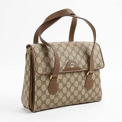Gucci GG Supreme Vintage Bag. Gucci GG Supreme top handle vintage bag. In beige and brown GG 
