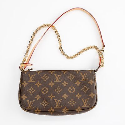 Louis Vuitton Pouchette Accessoires, post 2021 new in box. In brown monogram with leather trim 