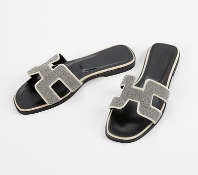 Hermes Oran Sandals sz 41. Hermes Oran sandals in black leather accented with white suede and 