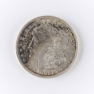 1921-D Morgan Silver Dollar Coin AU/MS. One 1921-D Morgan silver dollar coin. Dark toning 