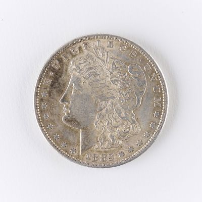 1882-S Morgan Silver Dollar Coin AU/MS. One 1882-S Morgan silver dollar. Dark toning, likely 